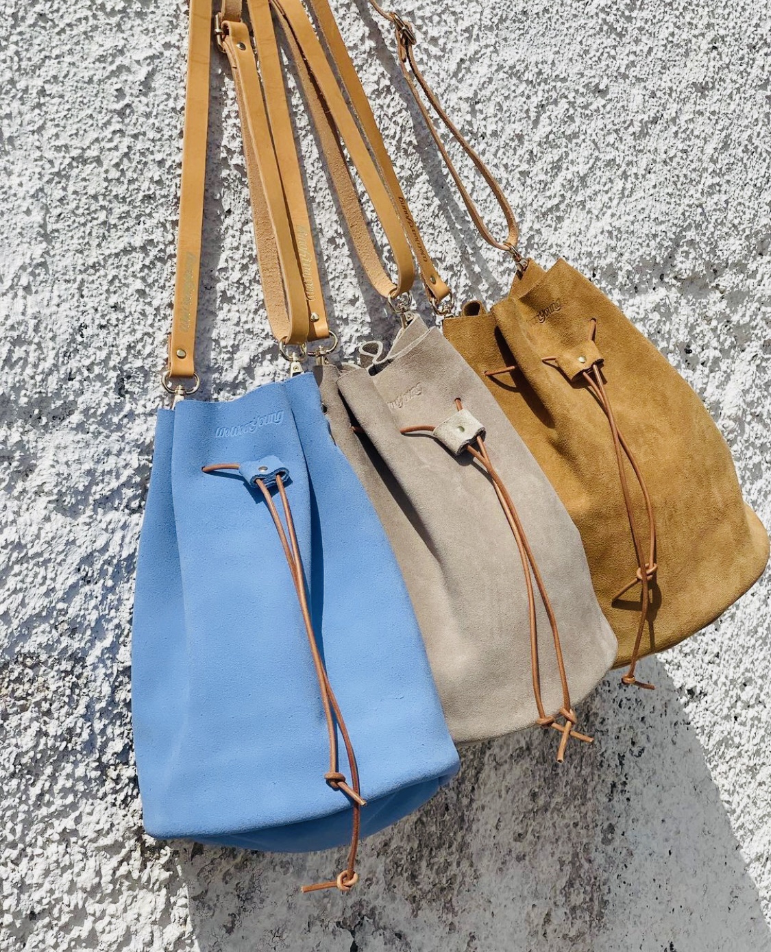 We Wear Young Mini πουγκί με λουρί (γαλάζιο)