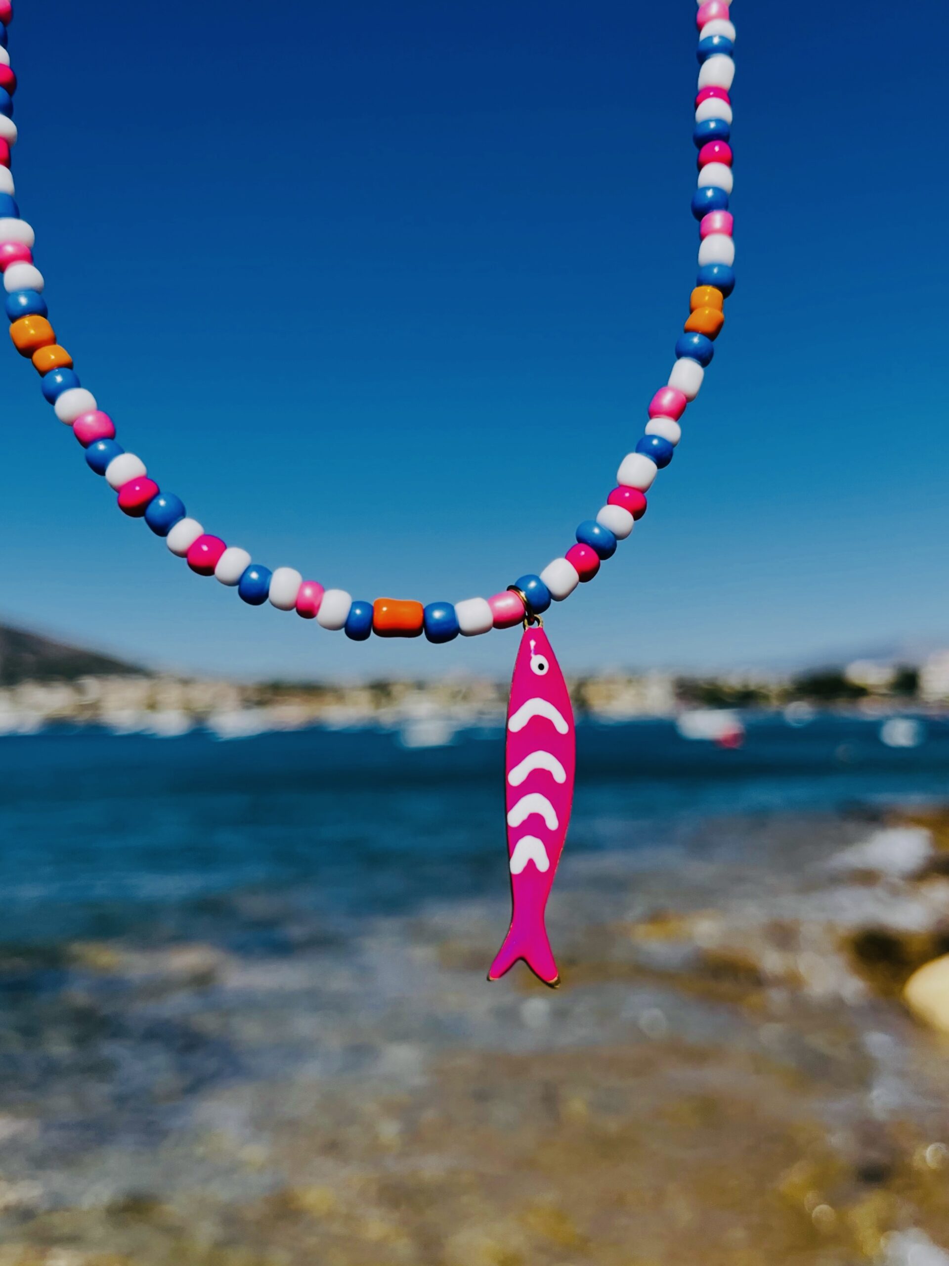 Purple fish necklace